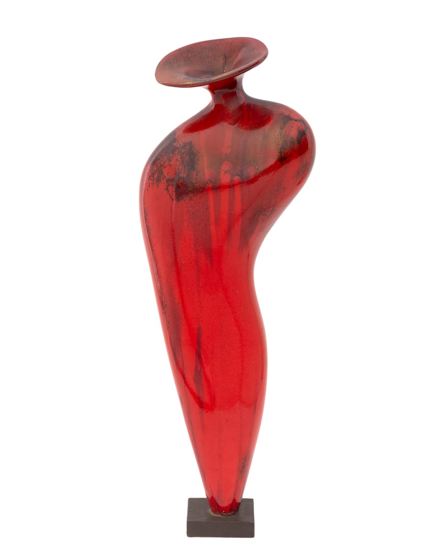 Postmodern Abstract Red Glazed Ceramic Vase: Postmodern Abstract Red Glazed Ceramic Vase, mounted on a square stone plinth. Overall: 23.5" H x 8" W x 3" D. Provenance: From a 45 Sutton Place South Estate. Keywords: Art Pottery, Ceramics, Moderni
