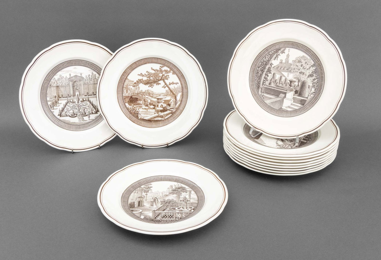 Wedgwood The Garden Club of America Plates, 12: Set of 12 Wedgwood The Garden Club of America Porcelain Plates, with black and white transferware landscape design to the center, marked "Types of Gardens / Through the Ages / Early Italian / The Gard
