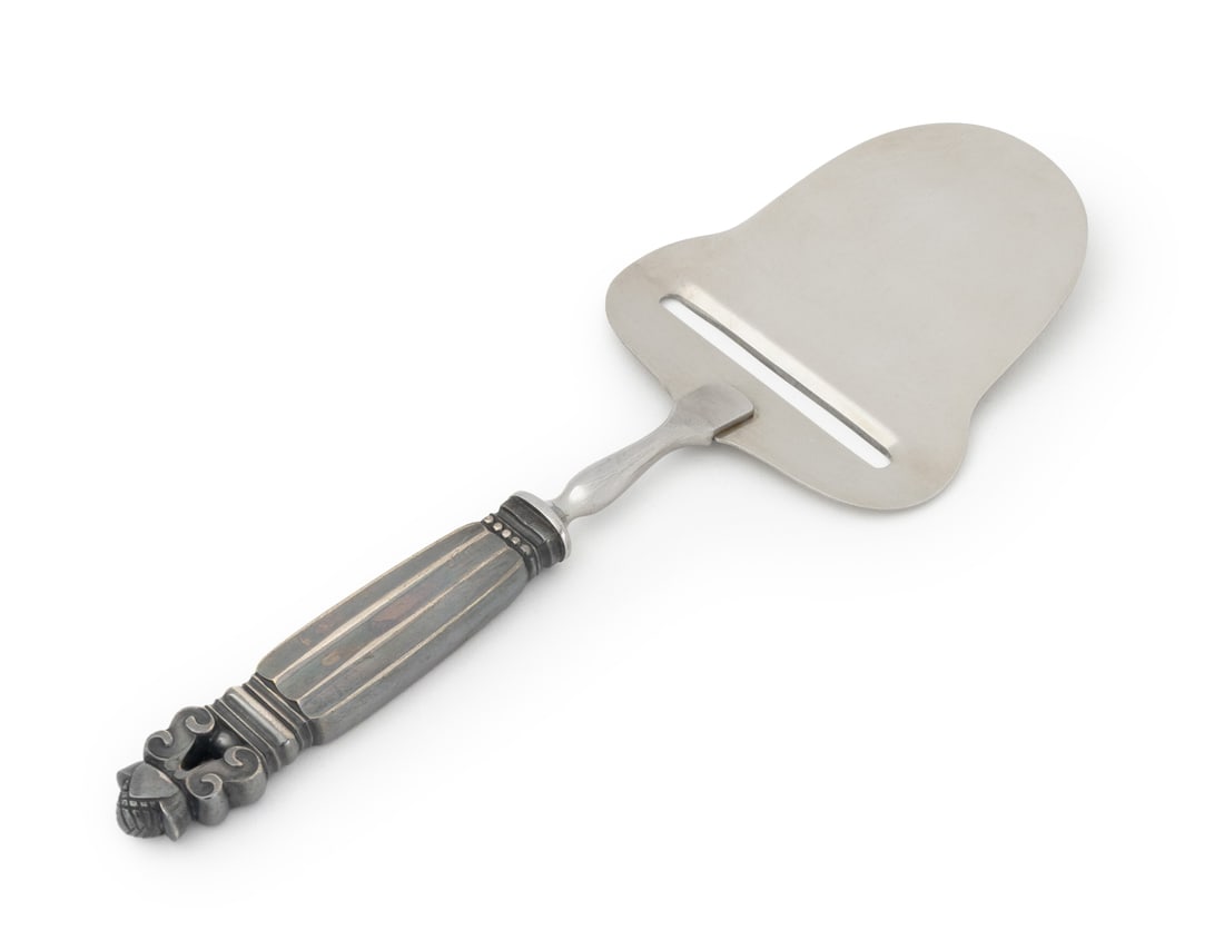 Georg Jensen "Acorn" Sterling Silver Cheese Plane: Georg Jensen "Acorn" Pattern Sterling Silver Cheese Plane, blade marked "Stainless Steel Raadvad / Georg Jensen / Denmark", handle marked "Sterling / Denmark". Silver weight approx.: 0.5 ozt.; 8.25"