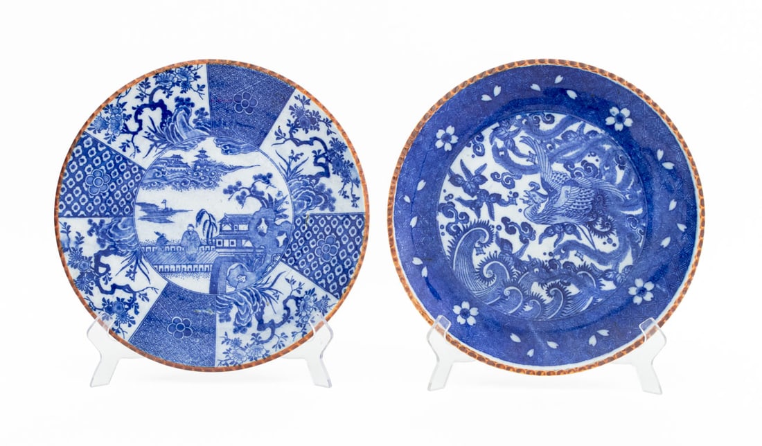 Japanese Igezara Blue White Porcelain Chargers, 2: Two Japanese Igezara Style Blue and White Porcelain Chargers, one with peacock motif to the center and one with figural garden landscape, partial stamped character mark to the underside, each with bro
