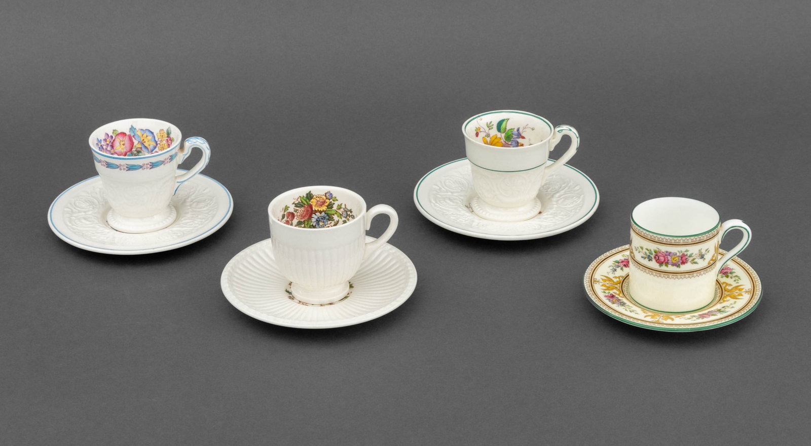 Wedgwood Demitasse Sets, 8 Pcs.: Group of Four Wedgwood Ceramic Demitasse Sets, each marked to underside and comprising: "Morning Glory" Patrician set, "Conway" Edme set, "Bognor" Patrician set, and the "Columbia" set. 8 pieces total
