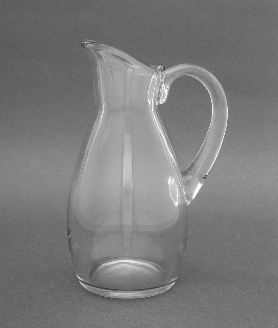 Baccarat Crystal Water Jug: Baccarat Crystal Water Jug, marked "Baccarat France" to underside. 10.25" H x 7" W x 5" D. Provenance: From a 45 Sutton Place South Estate. Keywords: Designer, French cristal, Vessel, Pitcher,