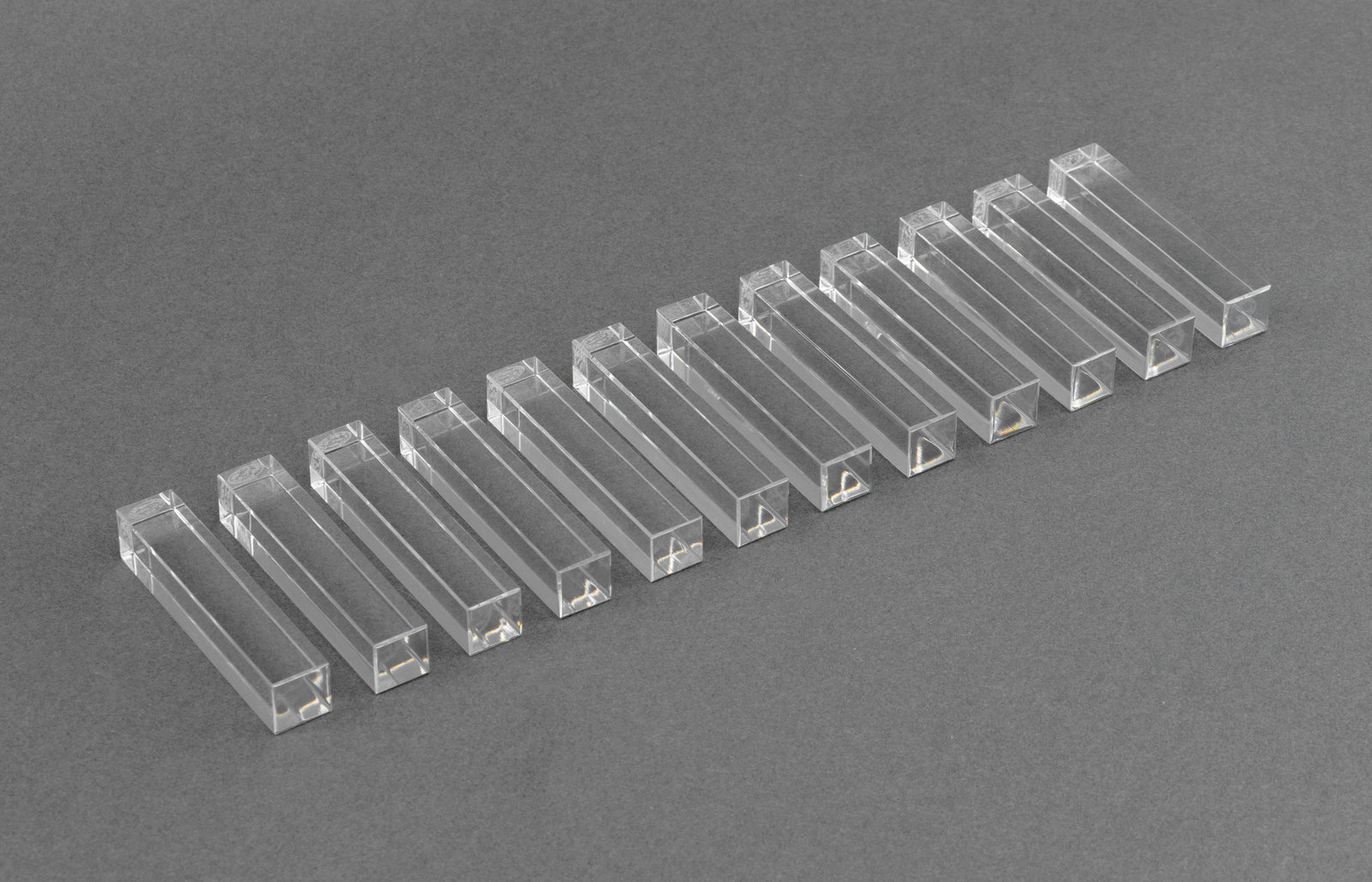 Baccarat Crystal Knife Rests, 12: Set of 12 Baccarat Crystal Knife Rests, acid-etched marks to the undersides. 3.25" L x 0.625" W x 0.625" D. Provenance: From an East 74th Street Estate. Keywords: French cristal, Designer, Luxury
