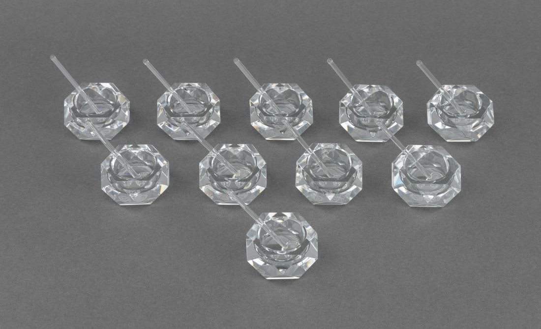 Baccarat Crystal Salt Cellars and Spoons, 10: Set of Ten Baccarat Crystal Open Salt Cellars and Spoons, the cellars marked "Baccarat France" to undersides, the spoons with shell form bowls. Cellar: 1" H x 2.25" Diameter. Provenance: From an East