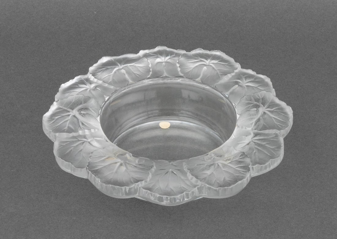 Lalique Crystal "Honfleur" Bottle Coaster: Lalique Crystal "Honfleur" Pattern Wine Bottle Coaster, marked "Lalique France" to underside. 2.25" H x 8.5" Diameter. Provenance: The Estate of Alton G. Marshall, former aide to Nelson Rockefeller