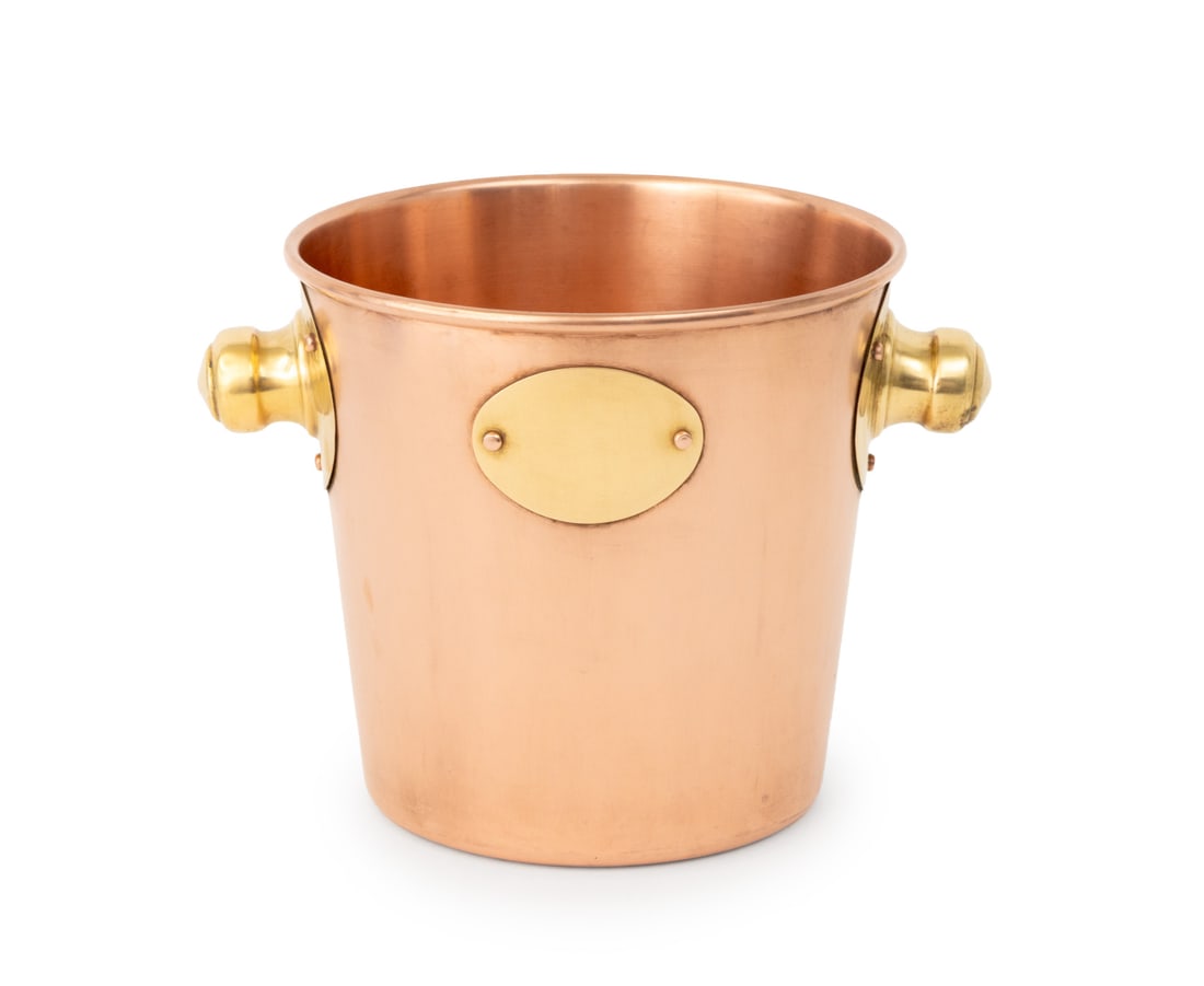 Cobre Copper and Brass Ice Bucket: Cobre Copper and Brass Ice Bucket, with two handles, marked "Cobre / Made in Chile" to underside. 8" H x 11" W x 8.5" D. Provenance: From a 390 West End Avenue Estate. Keywords: Oenology, Wine cooler,