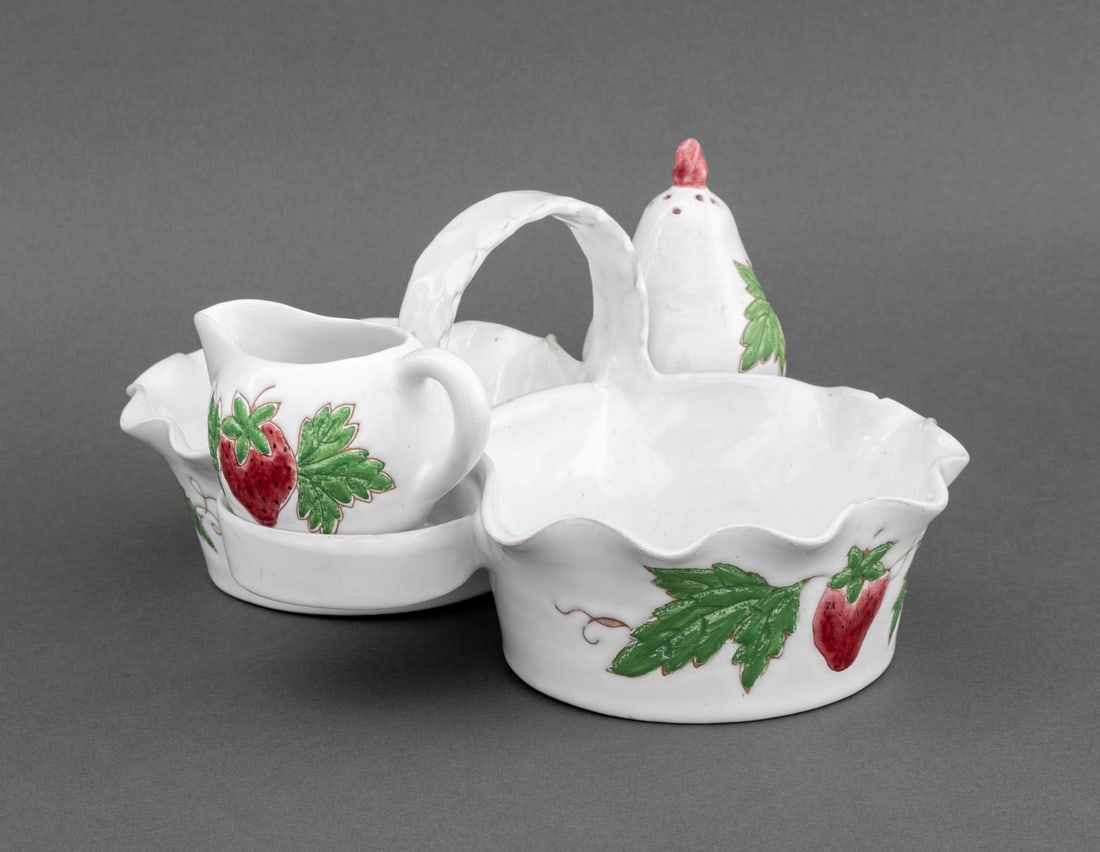 Italian Glazed Ceramic Cruet Set, 3 Pcs.: Italian Glazed Ceramic Three-Piece Cruet Set, with painted strawberry design, comprising: salt shaker, creamer, and double bottle holder with top handle, marked "Made in Italy" to underside. Overall: 