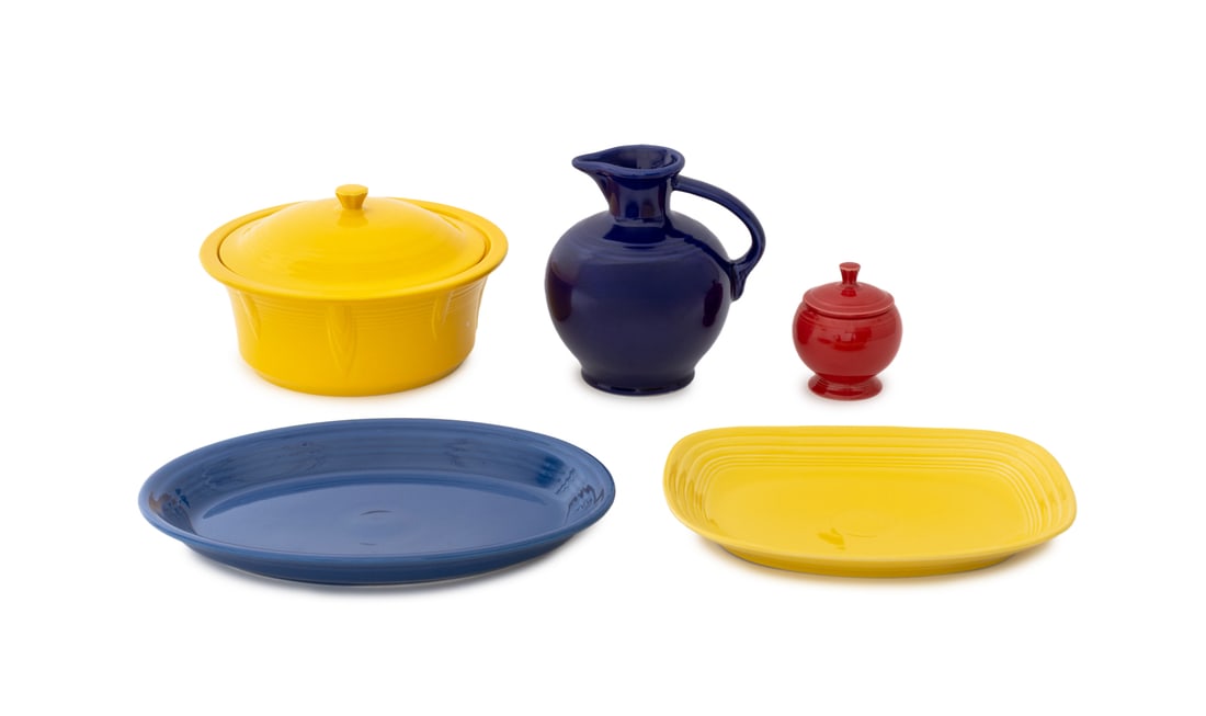 Homer Laughlin Fiesta Dinnerware, 5 Pcs.: Five Homer Laughlin Fiesta Dinnerware Pieces, comprising: a cobalt blue glazed jug, two platters, a covered sugar jar, all marked "HLC Fiesta U.S.A." to undersides, and a yellow glazed covered bowl ma