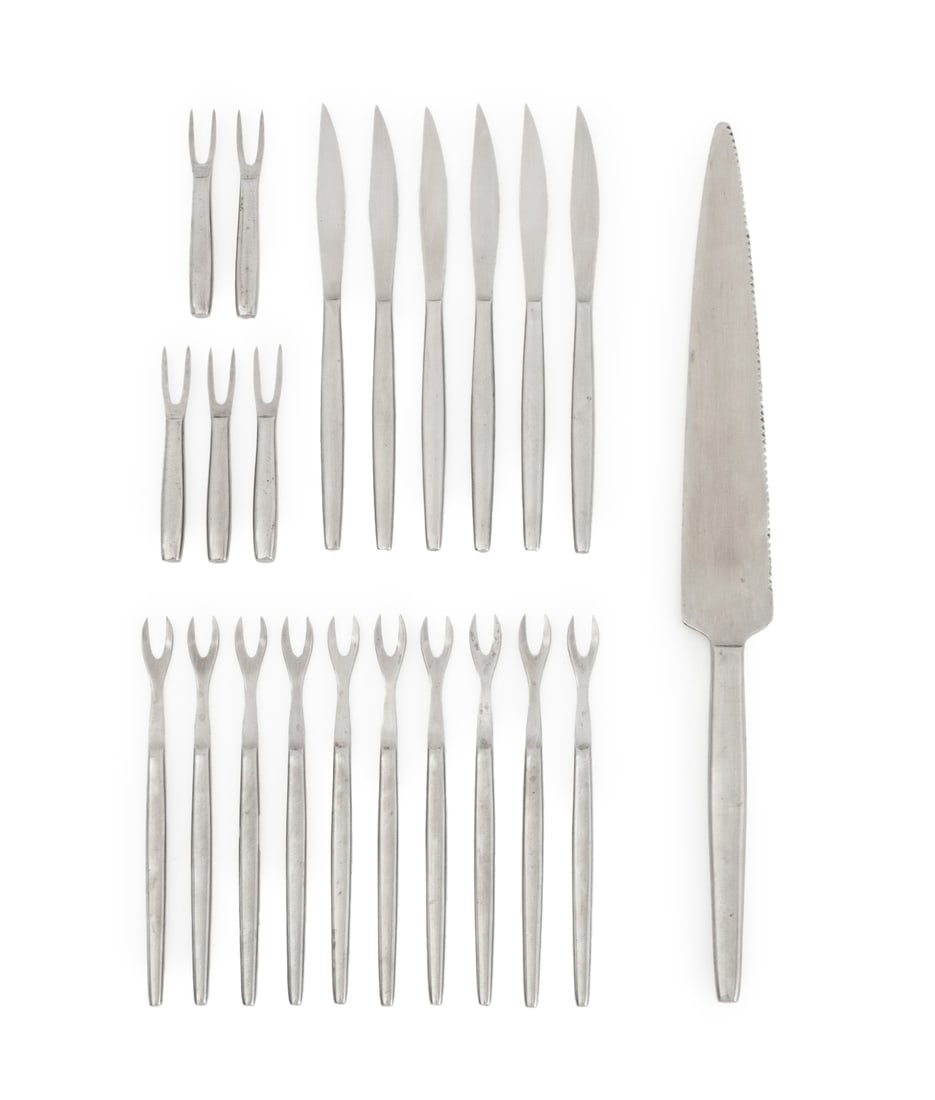 Kalmar Stainless Steel Flatware, 22 Pcs.: Set of 22 Kalmar Stainless Steel Flatware Pieces, comprising: (10) ten cocktail forks, (5) five miniature cocktail forks, (6) six knives, and (1) one serated knife, marked. Largest: 14" L. Provenance: