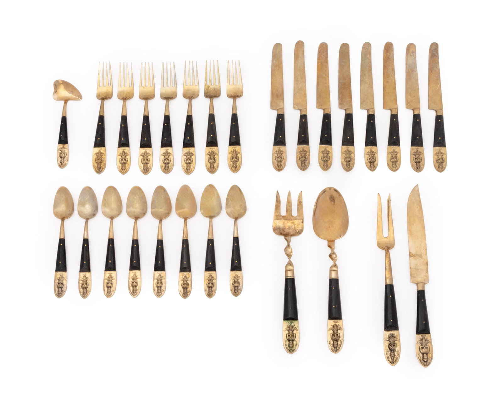 Siam Buddha Brass and Wood Flatware Service for 8: Siam Buddha Brass and Wood Flatware Service for Eight, black lacquered wood handles, meditating Buddha motif and marked "Siam" to end of handle, comprising: seven (7) forks, eight (8) spoons, eight (8
