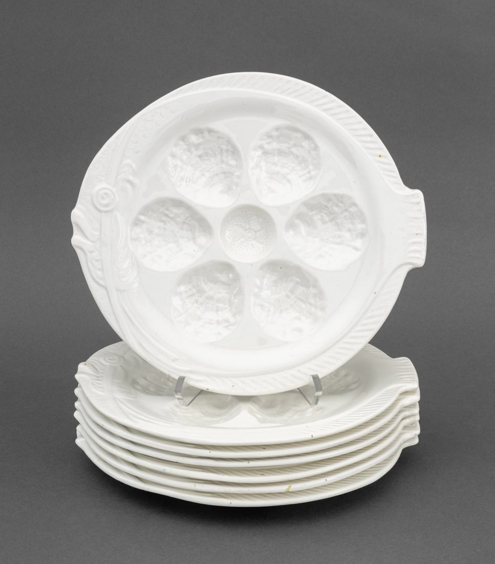 Portieux Vallerysthal White Oyster Plates, 7: Set of Seven Portieux Vallerysthal White Glazed Earthenware Oyster Plates, each marked "P. V. / Made in France" to underside. 11" Diameter x 1" D. Provenance: From an East 74th Street Estate.