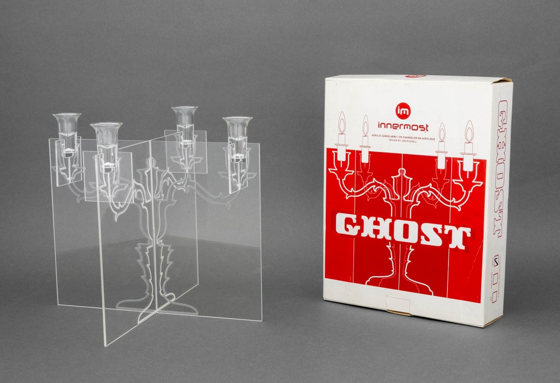 Jon Russell x Innermost "Ghost" Acrylic Candelabra: Jon Russell for Innermost "Ghost" Clear Acrylic Candelabra, interlocking acrylic sheets with glass candle holders, with original box. 11.75" H x 12.75" W x 12.75" D. Provenance: From a New York City C