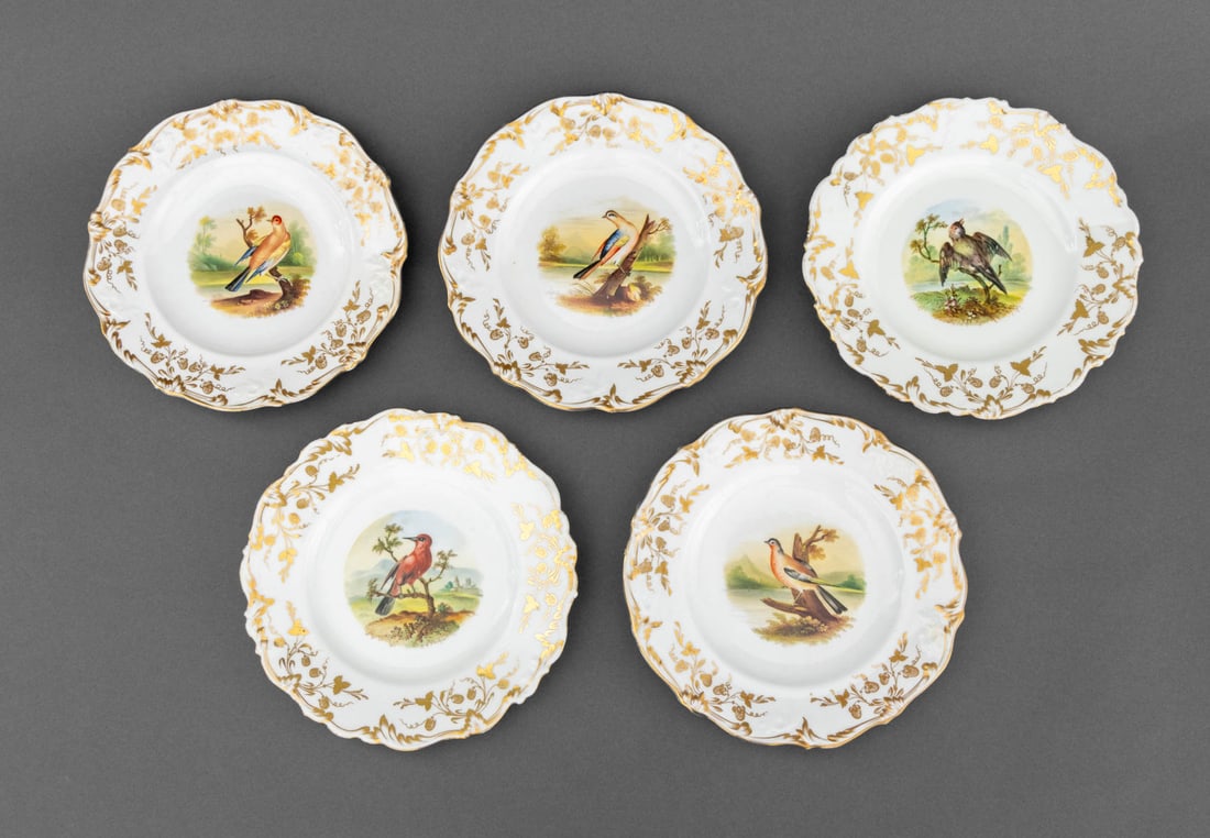British Bird Motif Porcelain Plates, 5: Set of Five British Bird Motif Porcelain Plates, each with scalloped edge and gilt trim and painted bird vignette to the center, unmarked. 9.25" Diameter. Provenance: From an East 74th Street Estate. 