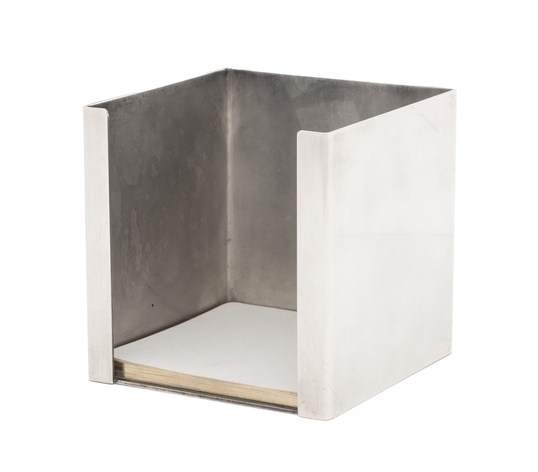 Hermes Silver Plate Memo Pad Holder: Hermes Silver Plate Memo Pad Holder, marked "Hermes, Paris / Made in France" to underside. 3.75" H x 3.75" W x 3.75" D. Provenance: From a New York City Collection. Keywords: Luxury goods, Desk
