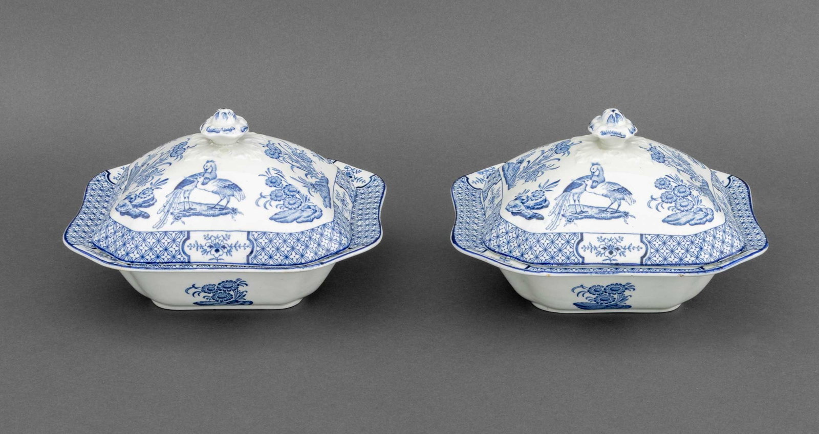 Wood & Sons "Yuan" Blue & White Covered Tureens, 2: Pair of Wood and Sons "Yuan" Pattern Blue and White Ceramic Covered Tureens, with floral knops, marked "Yuan / Wood and Sons / England" to undersides. 5.5" H x 9.25" W x 9.5" D. Provenance: From a