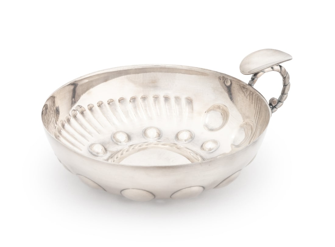 French Mid-Century Modern Silver Plate Tastevin: French Mid-Century Modern Silver Plate Tastevin, marked "6G" and with Deschamps Freres mark side of rim. 3.25" H x 7.25" W x 6" D. Provenance: From the Estate of Gerard Stora, Vice President of