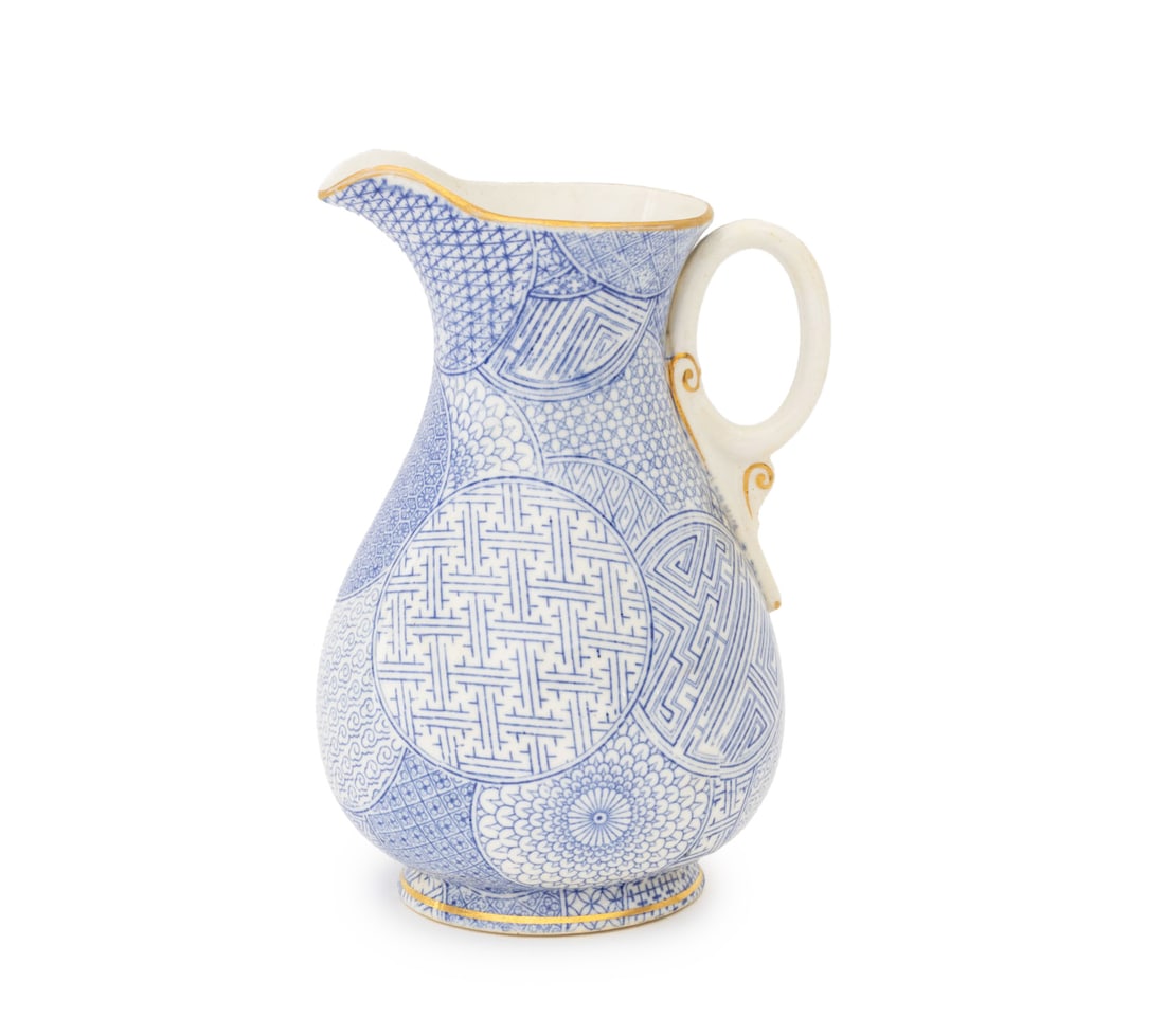 Royal Worcester Porcelain Water Jug, 1884: Royal Worcester Blue and White Porcelain Water Jug, 1884, with Aesthetic Movement pattern and gilt trim, marked to underside. 6.5" H x 5" W x 4.25" D. Provenance: From a West End Avenue Collection. Ke