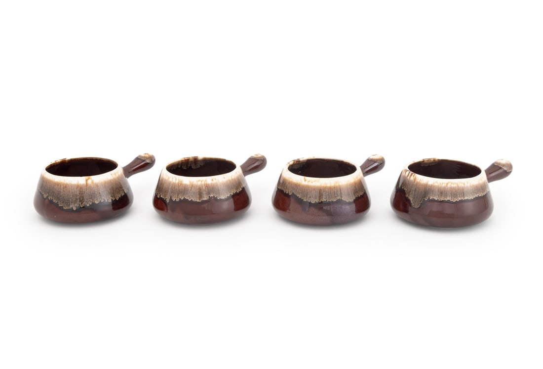 McCoy Brown Drip Glazed Ceramic Soup Bowls, 4: Set of Four McCoy Brown Drip Glazed Ceramic Soup Bowls, marked "7054 / McCoy / LLC / USA" to underside. 2.5" H x 7.5" W x 5" D. Provenance: From a Connecticut Estate. Keywords: Art Pottery, Studio Pot