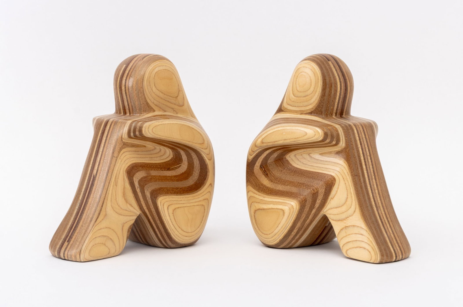 Robert Hargrave Figurative Bookends, Pair: Robert Hargrave (American, XX-XXI) Pair of Figurative Carved Wood Bookends, signed "R. Hargrave" to reverses. 9.5" H x 7.5" W x 4.5" D. Provenance: From a Warren, New Jersey Collection. Keywords: Wood