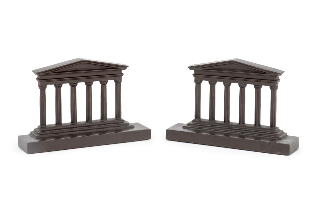 Cast Iron Parthenon Form Bookends, Pair: Pair of Cast Iron Parthenon Architectural Form Bookends. 4.5" H x 17" W x 1.75" D. Provenance: The Estate of Gilbert C. Maurer, Director and Former COO of Hearst, Former President of the Whitney Museu