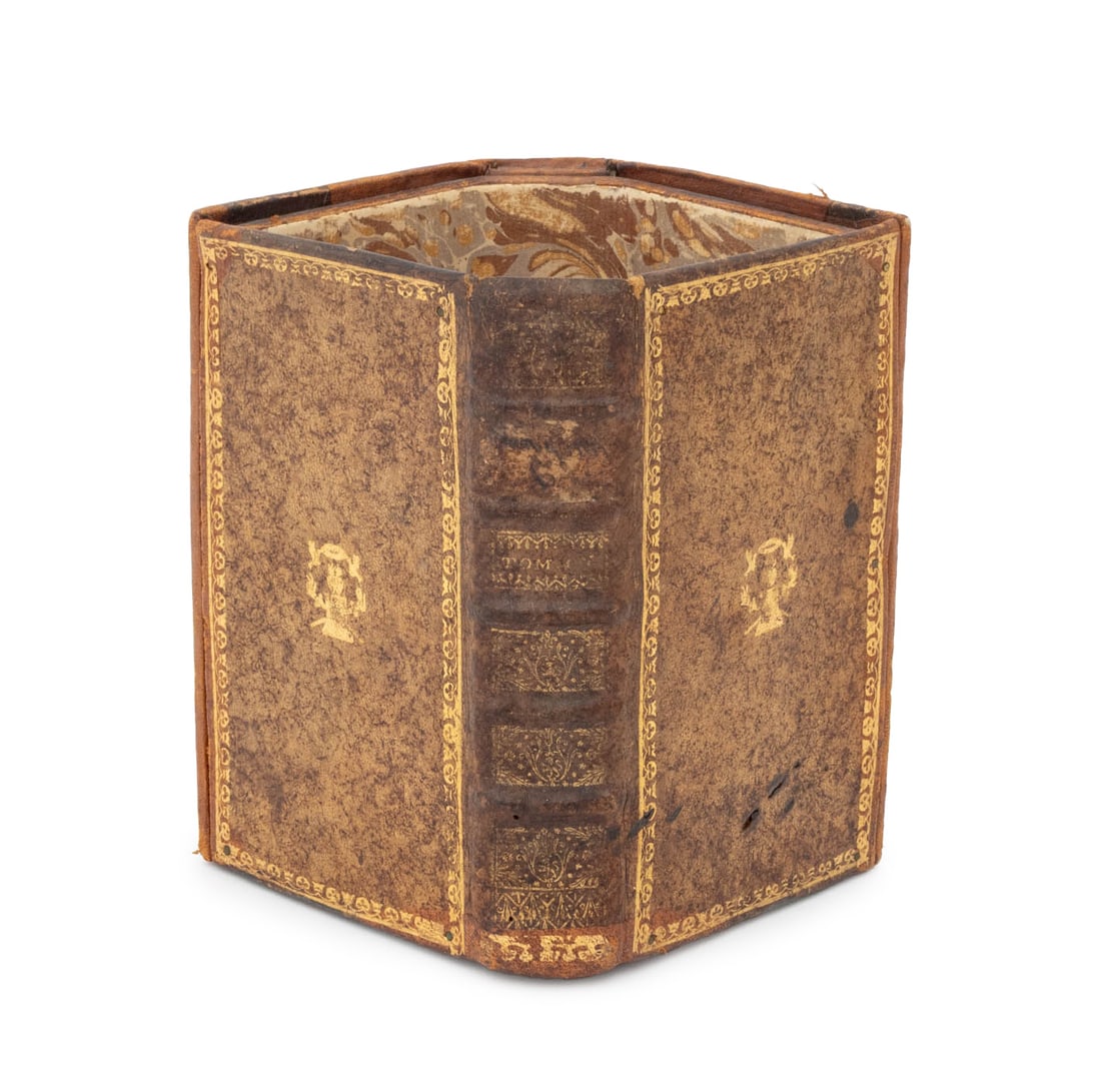 French Leather Book Cover Pencil Holder: French Gilt-Tooled Leather Book Pencil Holder, with marbled paper interior, marked "Made in France" to underside. 6.25" H x 6.5" W x 5.25" D. Provenance: From a New York City Collection. Keywords: Ant