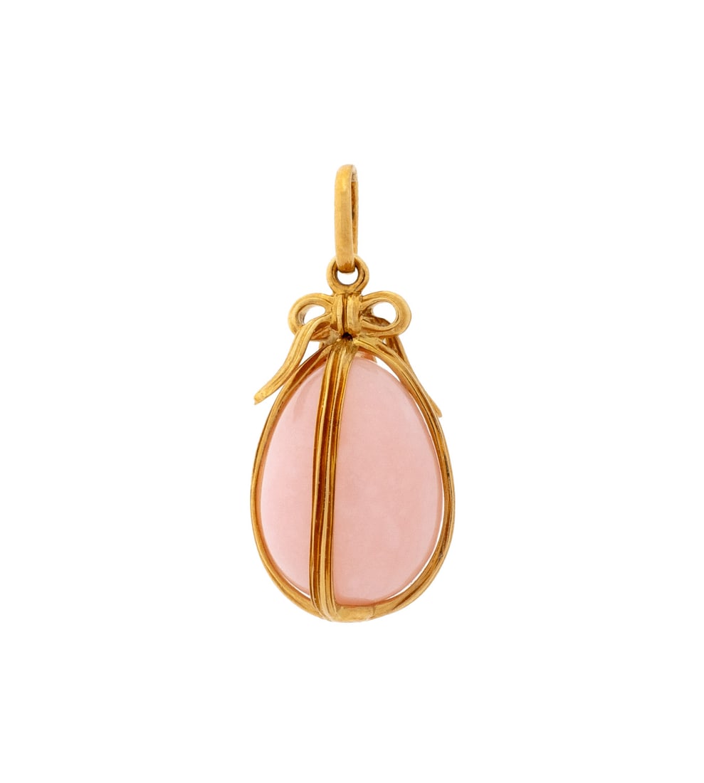 Schlumberger Tiffany & Co. Rose Quartz Egg Pendant: Jean Schlumberger for Tiffany and Company 18K Yellow Gold Egg Form Rose Quartz Pendant, featuring one small egg shaped rose quartz bead approx. 15.5 x 10.5 mm, set in closed four ribbed basket style s