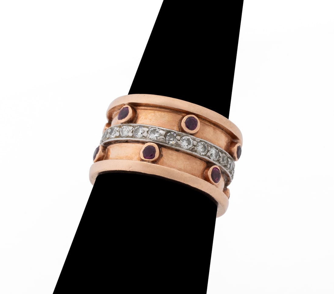 Ruby and Diamond Rose Gold and White Gold Band: Ruby and Diamond 14K Rose Gold and White Gold Band, featuring twelve bezel set round faceted rubies weighing a total of approx. 0.50 carat, further adorned with twenty-six bead set round brilliant cut