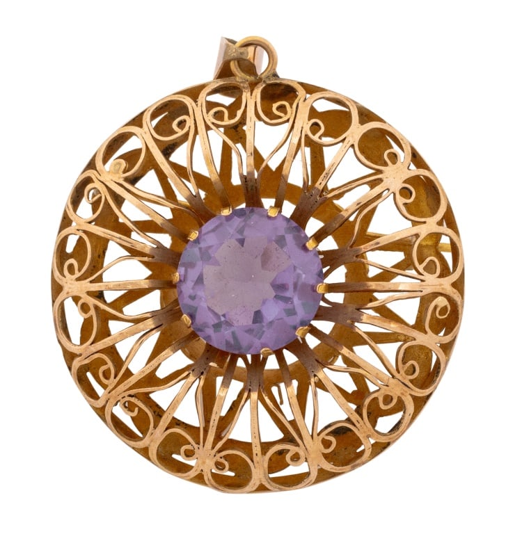 Color-Change Sapphire Rose Gold Brooch Pendant: Synthetic Color-Change Sapphire 14K Rose Gold Brooch Pendant, featuring one prong set round faceted synthetic color-change sapphire weighing approx. 6.50 carats, worn through fabric with pinstem, join