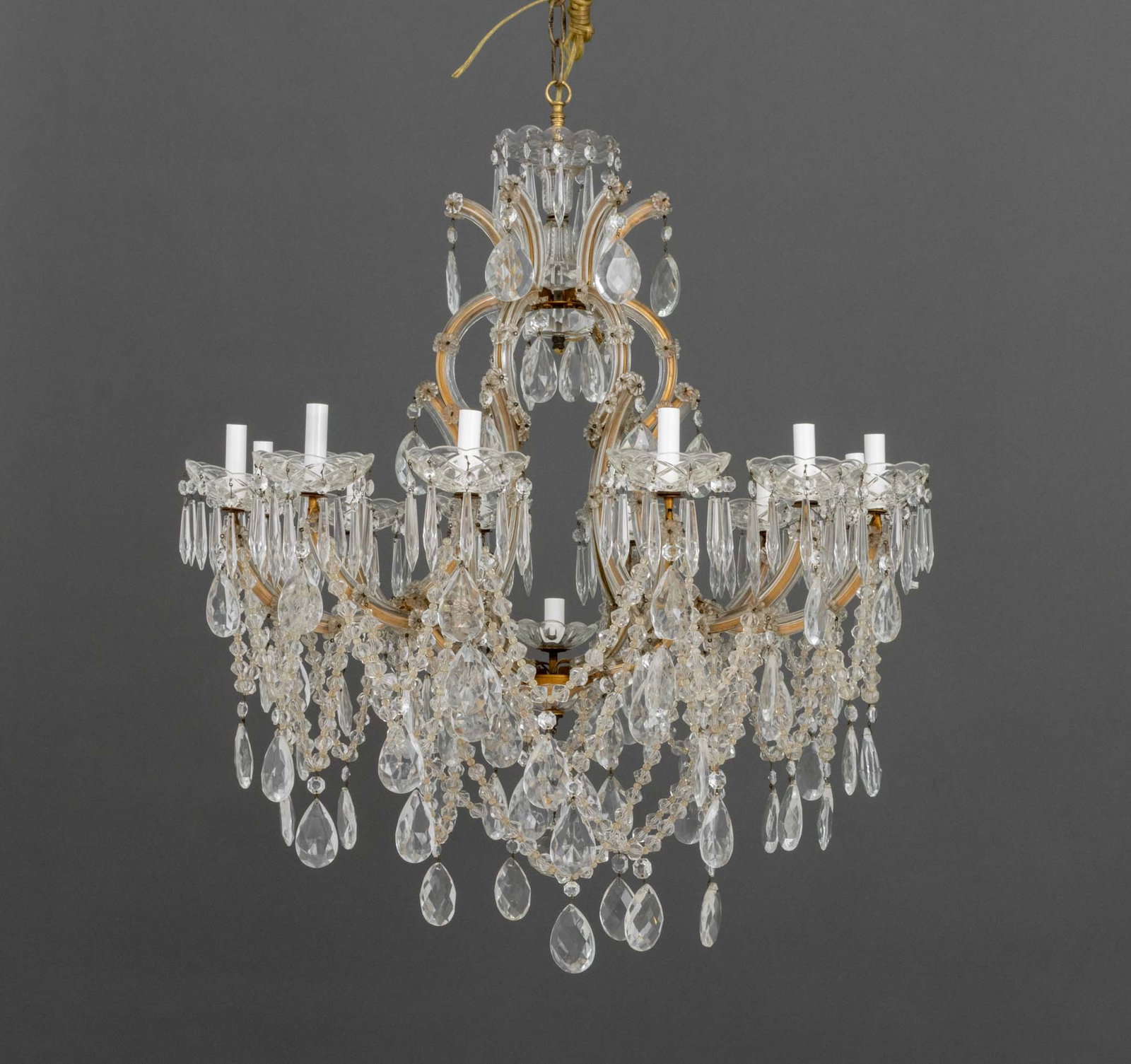 Maria Theresa Style Crystal Chandelier: Maria Theresa Style Crystal Chandelier, with twelve branches surrounding a central light. 36" H x 33" Diameter. Provenance: From a West End Avenue Collection. Keywords: Lighting, Hanging light, Ceilin