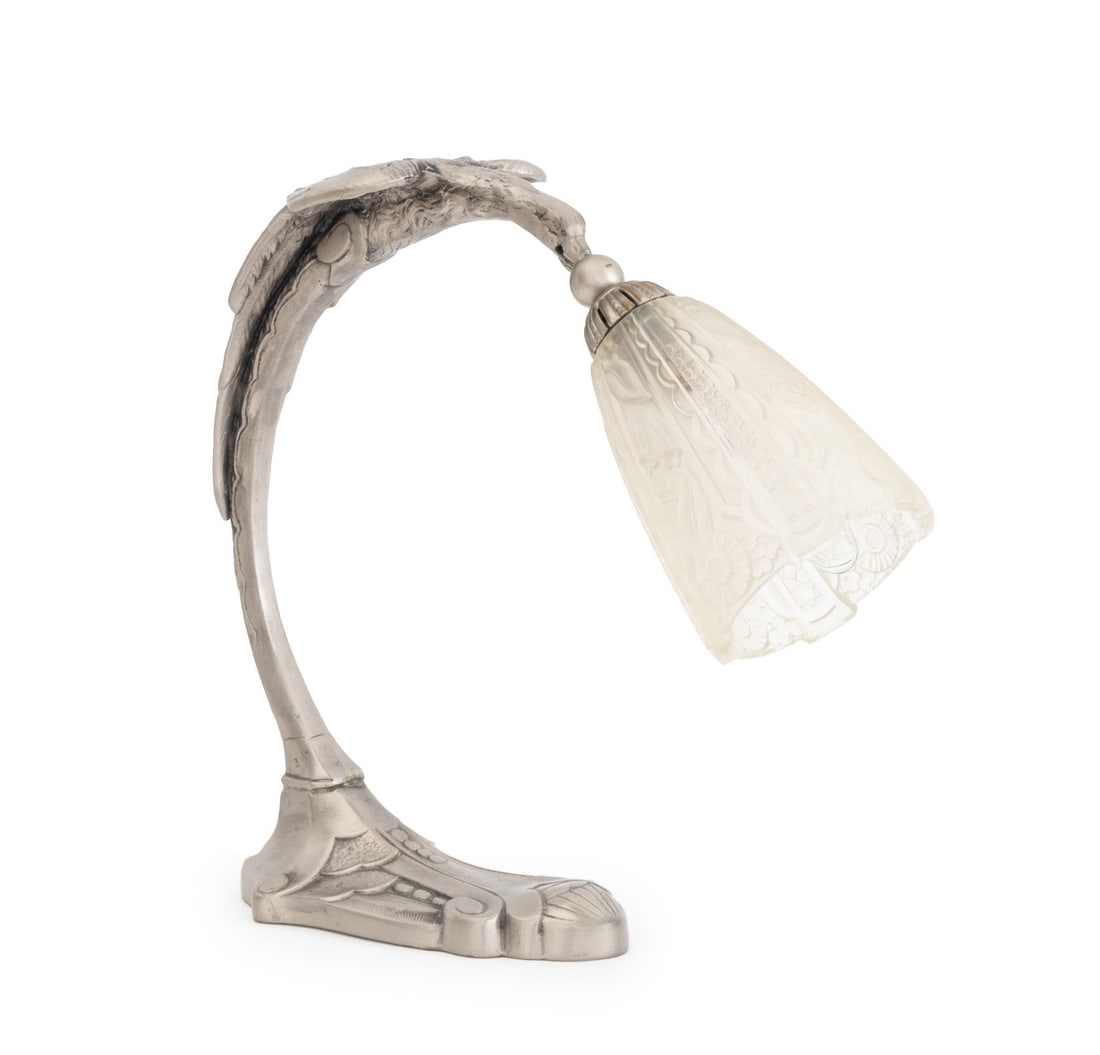 French Art Deco Eagle Form Chrome Table Lamp: French Art Deco Eagle Form Chrome Table or Desk Lamp, the frosted glass shade signed "Donna Paris". 12.75" H x 14.5" W x 4.5" W. Provenance: From a Long Island, New York Estate. Keywords: Muller Frere