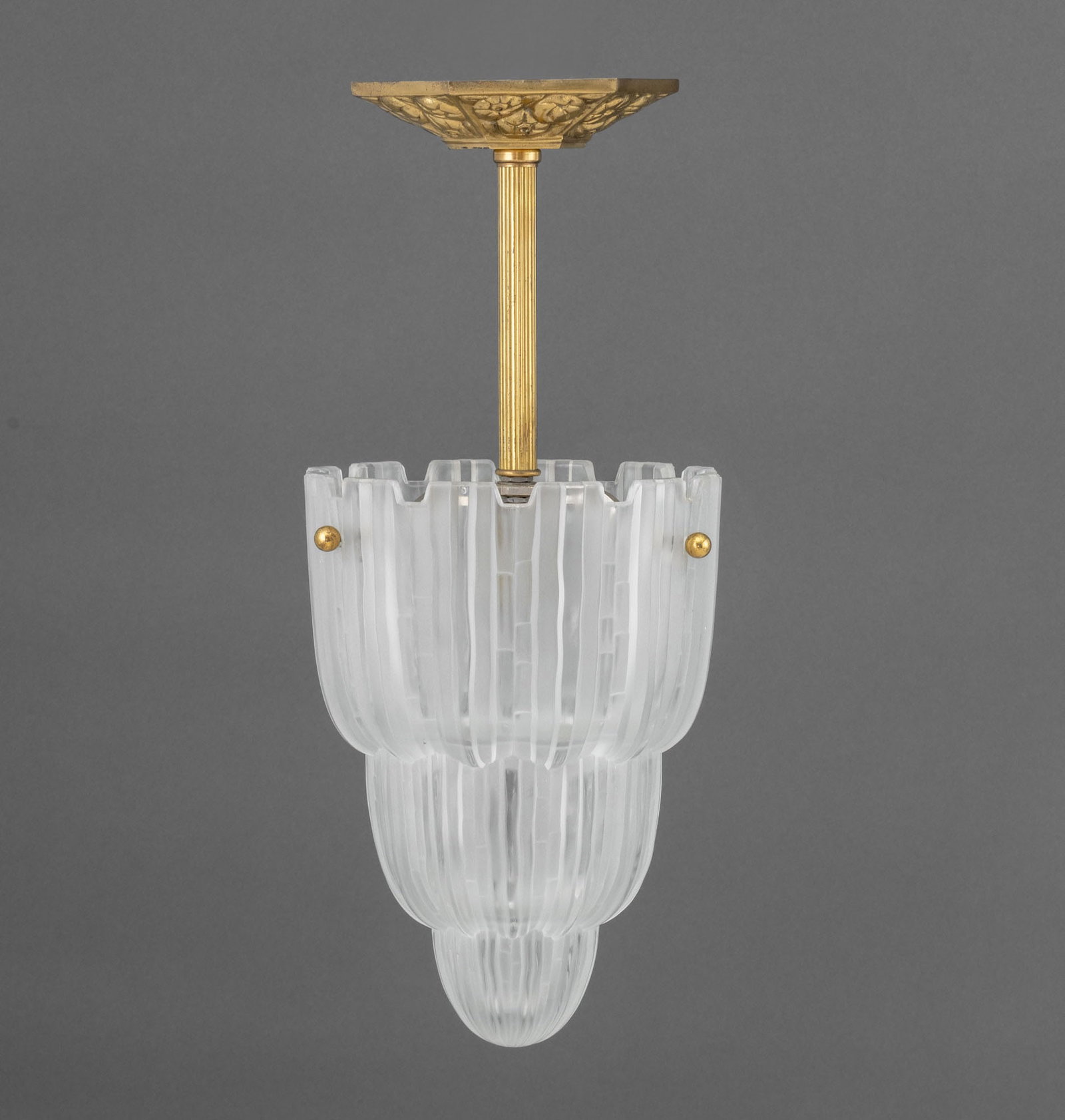Sabino French Art Deco "Waterfall" Pendant Lamp: Sabino French Art Deco "Waterfall" Pendant Lamp, with gilt brass ceiling mount, the tiered frosted glass shade marked "Sabino 4645 / Paris Depose" inside. 18.5" H x 8" Diameter. Provenance: From a Lon