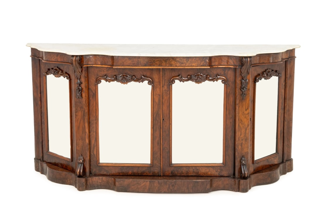 Victorian Walnut Mirrored Credenza: Victorian Walnut Mirrored Credenza, with white marble top above four mirror paneled doors opening to two shelves. 35" H x 73" W x 20" D. Provenance: From a Park Slope Estate. Keywords: Antique Furnitu