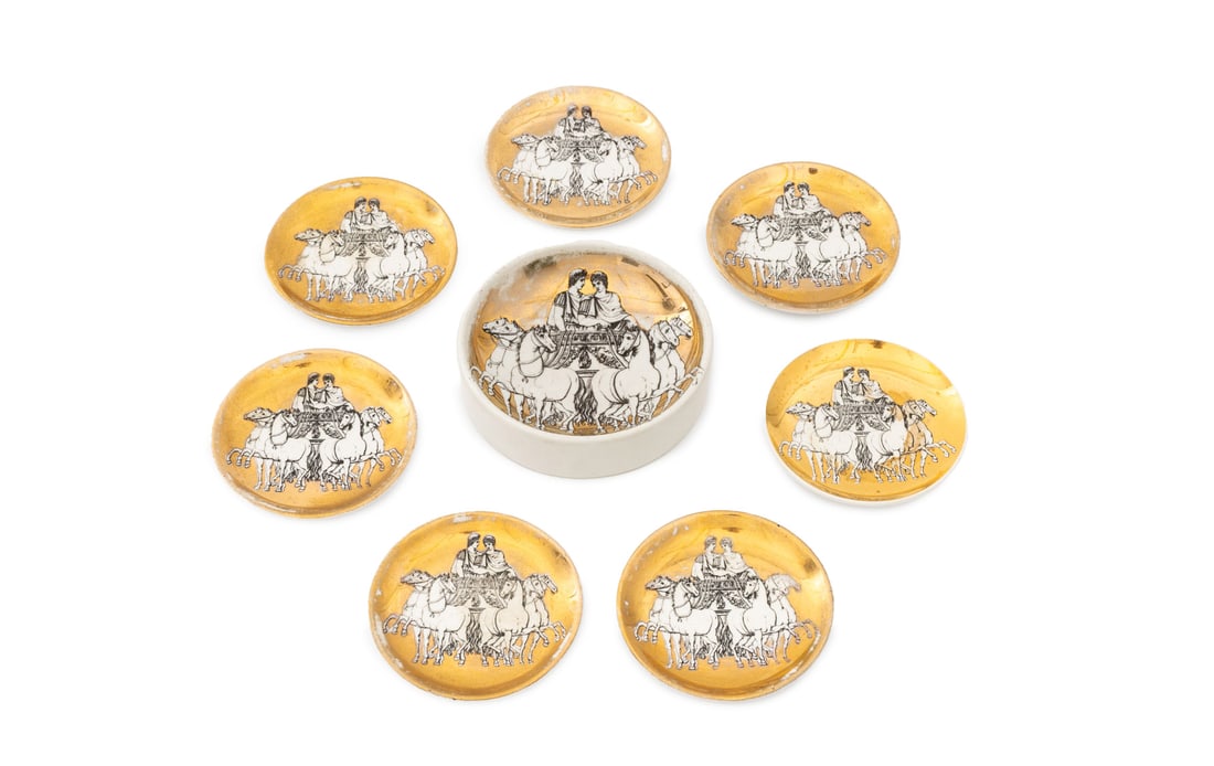 Fornasetti x Saks Roman Chariot Porcelain, 8 Pcs.: Set of Eight Fornasetti for Saks Fifth Avenue Roman Chariot Porcelain Tableware Pieces, comprising: seven coasters and one ashtray, with gilded grounds, marked "Fornasetti Milano / Made in Italy / Exc