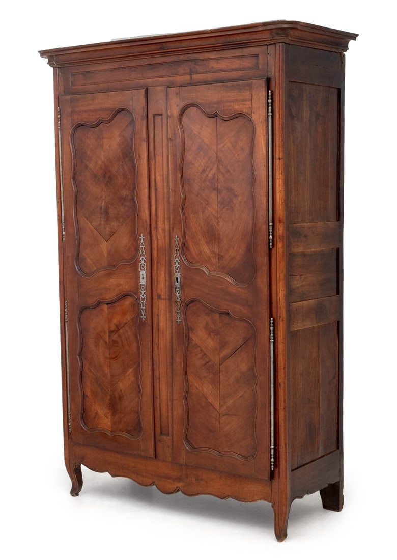 French Provincial Cherrywood Armoire: French Provincial Cherry Wood Armoire, the two doors opening to two shelves, with original locking mechanism, key present. 87" H x 51" W x 24" D. Provenance: From a 45 East 62nd Street Collection. Key