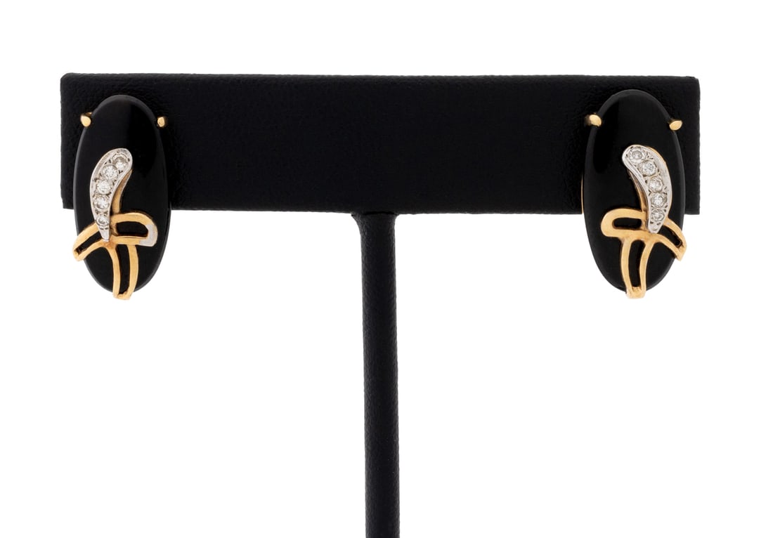 Art Deco Style Onyx & Diamond Yellow Gold Earrings: Pair of Art Deco Style Onyx and Diamond 14K Yellow Gold Earrings, featuring two prong set marquise cabochon black onyx gemstones weighing a total of approx. 6.00 carats, adorned with 10 pave set round