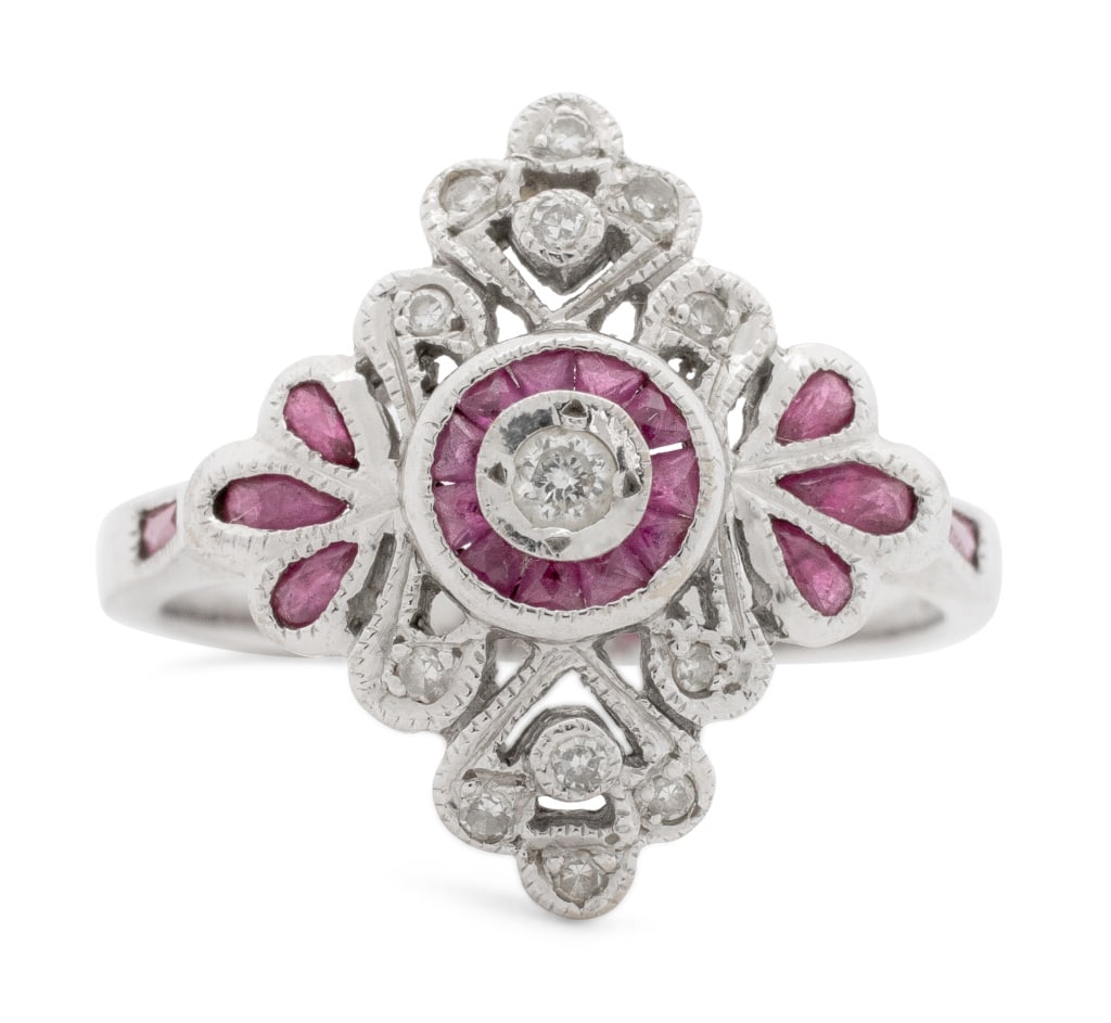 Art Deco Style Ruby and Diamond White Gold Ring: Art Deco Style Ruby and Diamond 14K White Gold Ring, featuring 13 round faceted diamonds bezel and bead set weighing a total of approx. 0.12 carat, further adorned with 17 bezel and channel set rubies