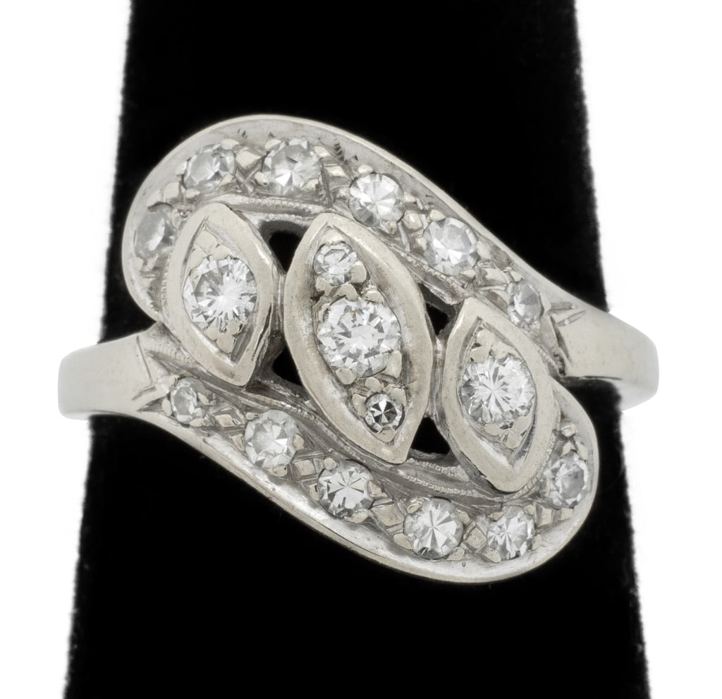 Diamond Pave Cluster White Gold Ring: 14K White Gold Diamond Pave Cluster Ring, featuring 17 pave set round brilliant cut and 17 diamonds, weighing a total of approx. 0.55 carat, marked: Maker's mark logo. Gold tested. Measuring approx. U