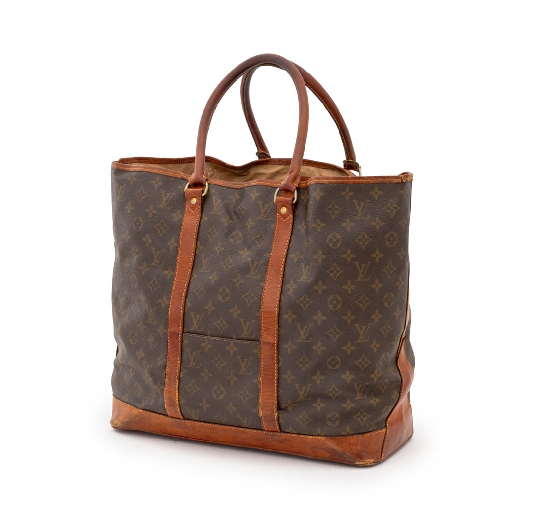 Louis Vuitton Monogram Sac Weekend Bag: Louis Vuitton Monogram Sac Weekend Bag, leather handles, interior with zippered compartment. 15" H x 22" W x 8" D. Provenance: A Brooklyn Heights, New York Estate. Keywords: Vintage Vuitton, LV,