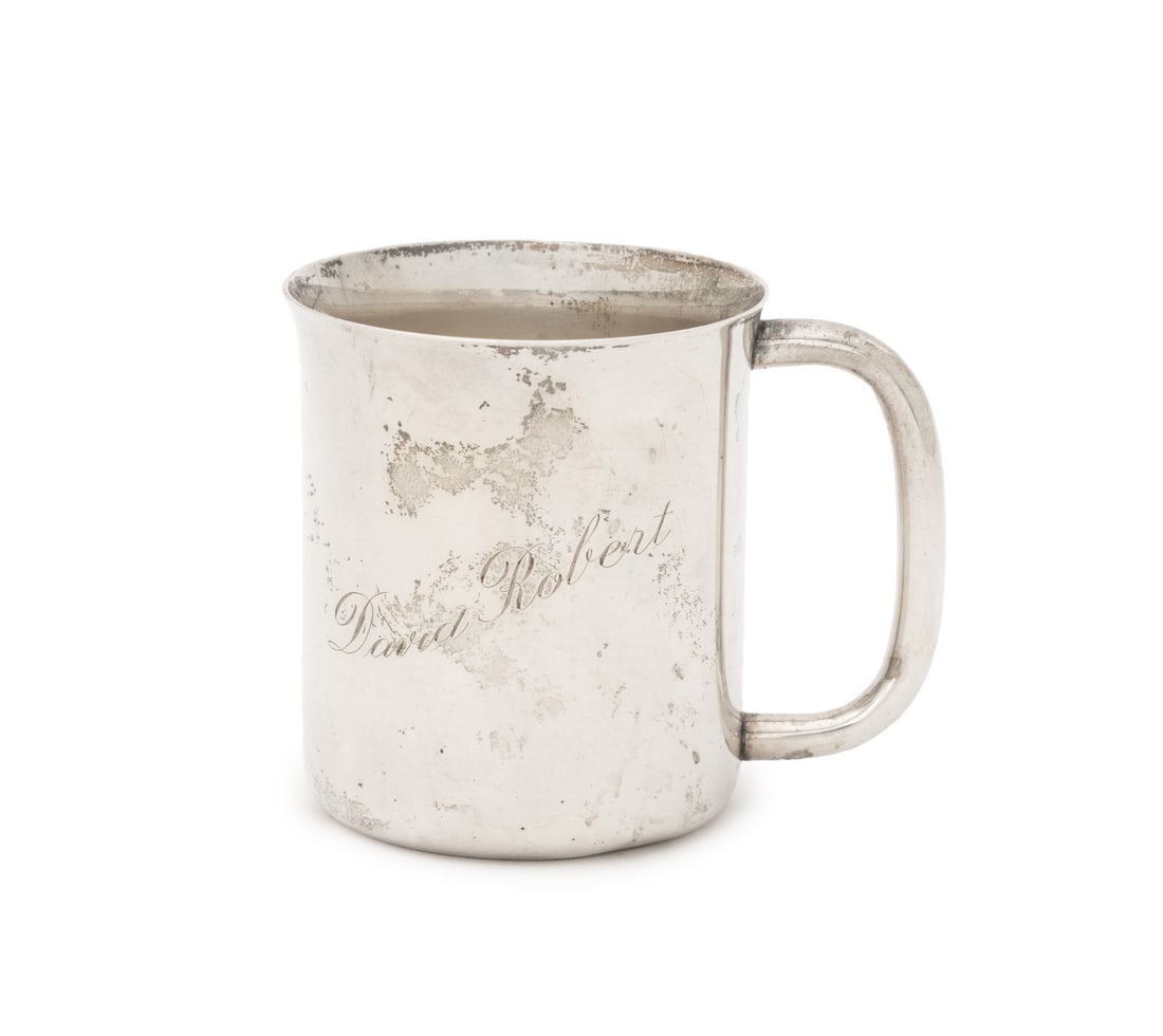 Cartier Sterling Silver Handled Cup: Cartier Sterling Silver Handled Cup, engraved "David Robert", marked "Cartier / Sterling" to underside. Weight: 4.72 ozt.; 3" H x 3.5" W x 2.75" D. Provenance: From a Long Island, New York Estate.