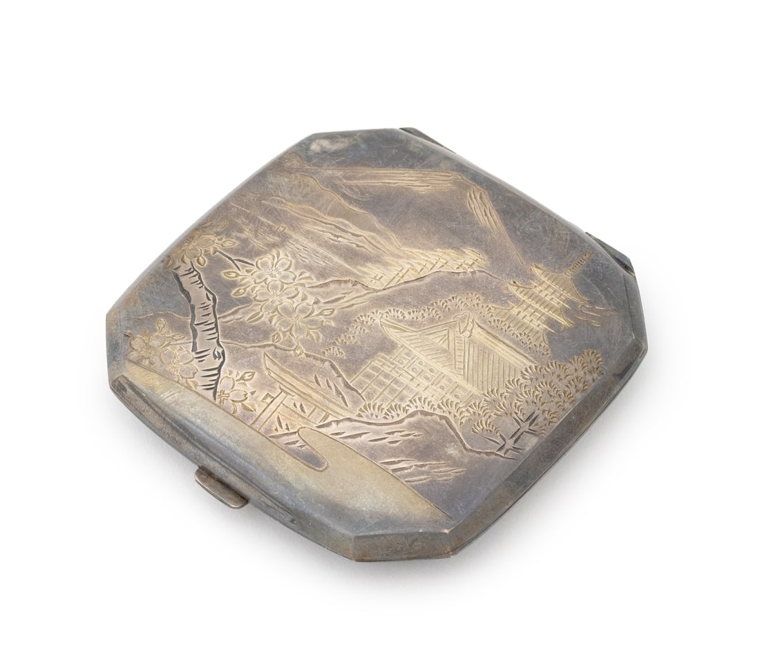 Japanese Sterling Silver Mirrored Compact: Japanese Sterling Silver Mirrored Compact, with incised pagoda and Mt. Fuji landscape scene, character mark to reverse and marked "Sterling Silver" to interior. Weight: 3.16 ozt.; 3" H x 3" W.