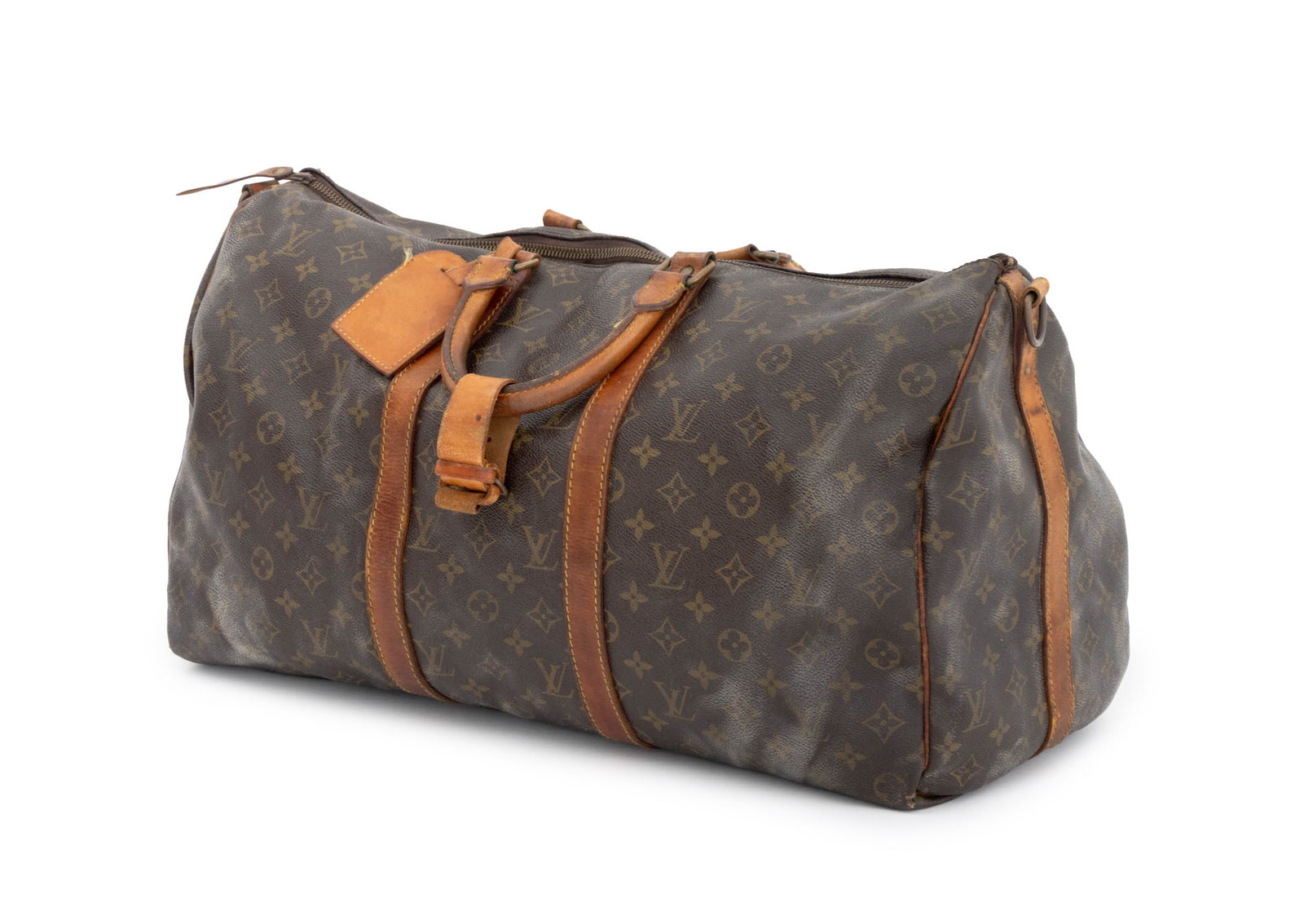 Louis Vuitton Monogram "Keepall" Travel Bag: Louis Vuitton Monogram "Keepall" Travel Bag, Vechetta leather handles, fabric interior. 11" H x 19.5" W x 9" D. Provenance: A Brooklyn Heights, New York Estate. Keywords: Vintage Vuitton, LV, Luggage 