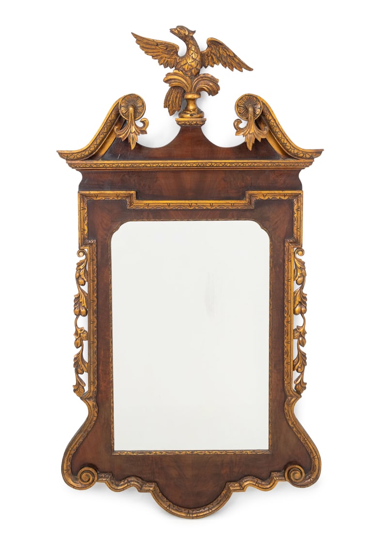 George II Style Parcel Gilt Mahogany Mirror: George II Style Parcel Gilt Mahogany Framed Mirror, 19th century, with carved eagle cresting. Mirror plate: 26.25" H x 17.5" W; frame: 55" H x 28.75" W x 3.25" D. Provenance: From a Park Slope Estate.