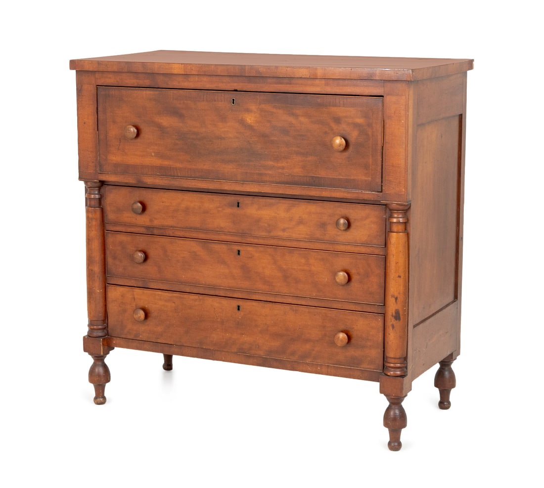American Empire Mahogany Chest of Drawers: American Empire Mahogany Chest of Drawers, 19th century, with four graduated drawers flanked by columns on turned wood feet. 44.75" H x 45" W x 22.25" D. Provenance: From a 21 East 87th Street