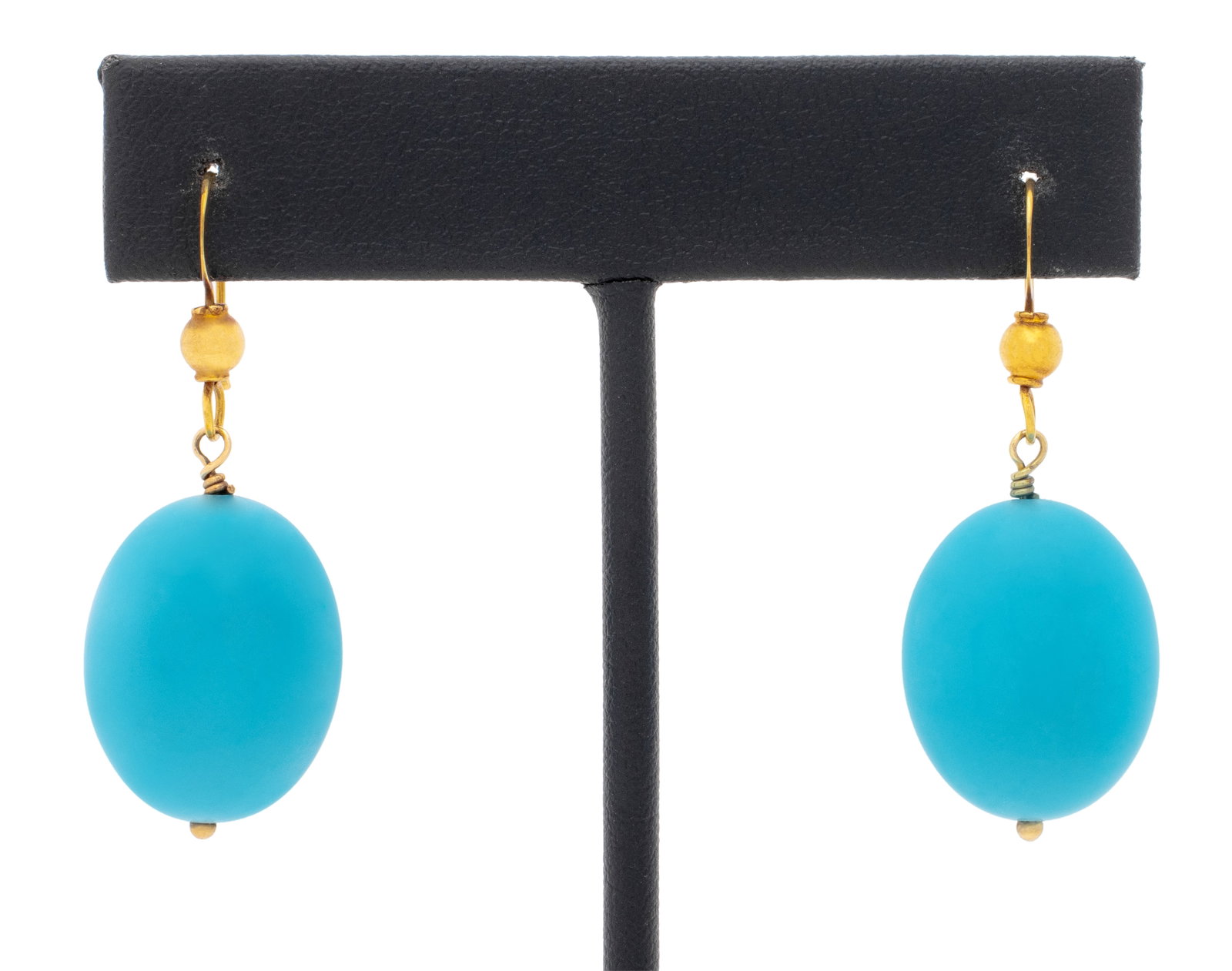 Turquoise 18K Yellow Gold Drop Earrings: Pair of 18K Yellow Gold Turquoise Drop Earrings, featuring two fully drilled turquoise beads approx. 20 x 16 mm., linked with 18K yellow gold wires, worn through pierced earlobes with shepherd's hook 