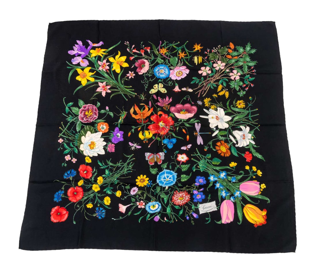 Gucci "Flora" Silk Twill Scarf: Gucci "Flora" Pattern Silk Twill Scarf, the black ground with various flowers, butterflies, and insects, marked "Gucci" in print. 34.25" L x 33.25" W. Provenance: From a New York City Collection.