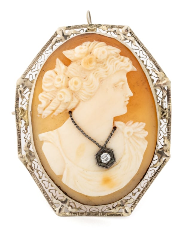 Vintage Carved Shell Cameo Gold and Diamond Pin: Vintage Carved Shell Cameo 14K Yellow Gold and Diamond Pin Pendant, decorated with one old European cut diamond weighing approx. 0.07 carat, worn through fabric with pinstem, joint and catch, worn as 
