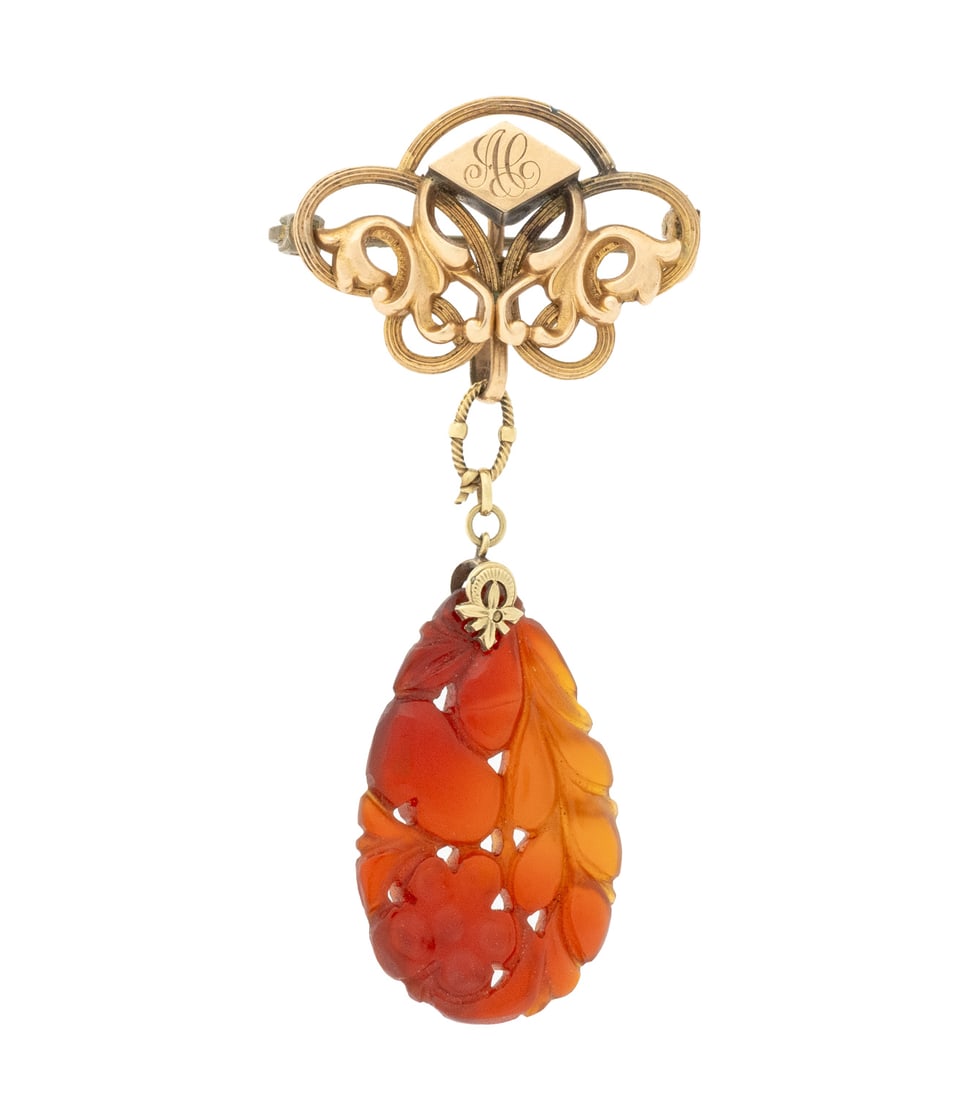 Antique Carved Carnelian and Gold Pendant Pin: Antique Carved Carnelian and 10K Yellow Gold Pendant Pin, featuring one detachable carved carnelian pendant weighing approx. 12.00 carats, pendant worn on 10K yellow gold open work pin with fixed