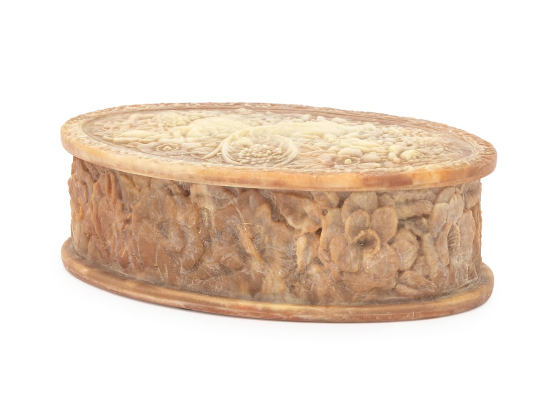 American Incolay Stone Jewelry Box: American Incolay Stone Jewelry Box, depicting two relief carved pheasants amongst flowers, with label "Genuine Incolay Stone / Handcrafted U.S.A." to underside. 3.25" H x 10.25" W x 6.75" D. Provenanc