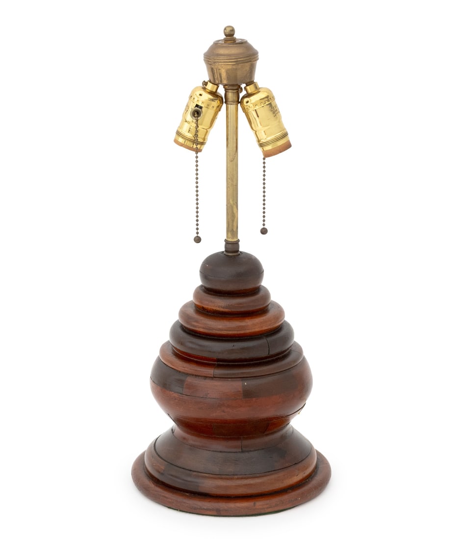 American Turned Wood Beehive From Table Lamp: American Turned Wood Beehive From Table Lamp, with two light sockets. 19" H x 8.75" Diameter. Provenance: From a 21 East 87th Street Estate. Keywords: Americana, Vintage, Lighting, Accent lamp, Folk A