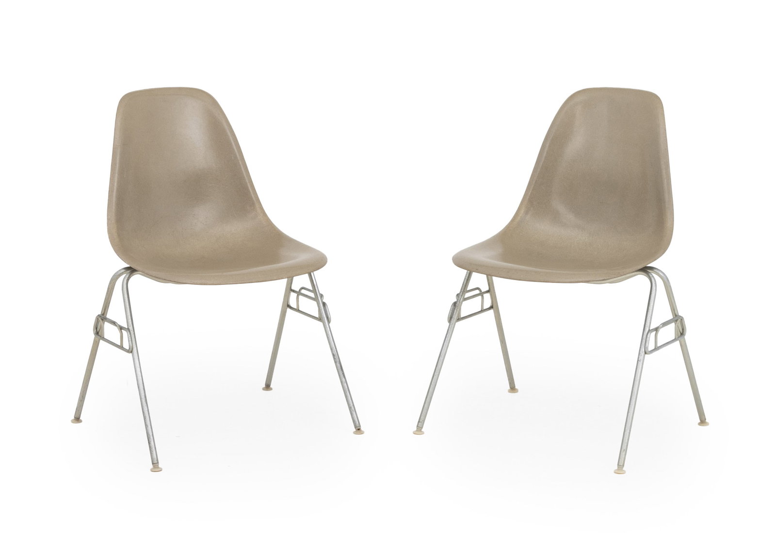 Eames for Herman Miller Shell Chairs, Pair: Pair of Eames for Herman Miller Shell Chairs, each with gray fiberglass seat on chrome-plated legs and label to underside. 32.25" H x 18.5" W x 20" D; seat: 18" H. Provenance: From a Long Island, New